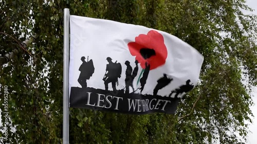 Lest We Forget flag fluttering in the breeze, remembering the soldiers who died in First World War.