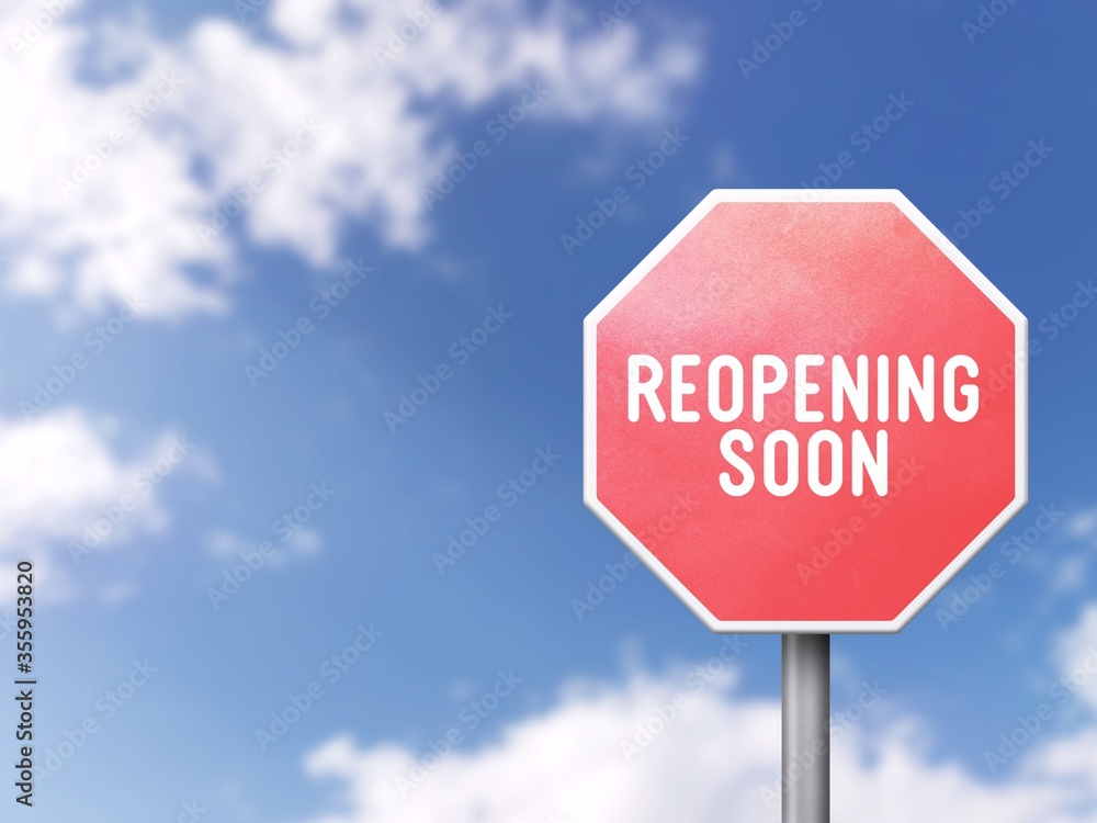 Reopening soon - Road sign on blue sky background Reopening soon - Road sign on blue sky background