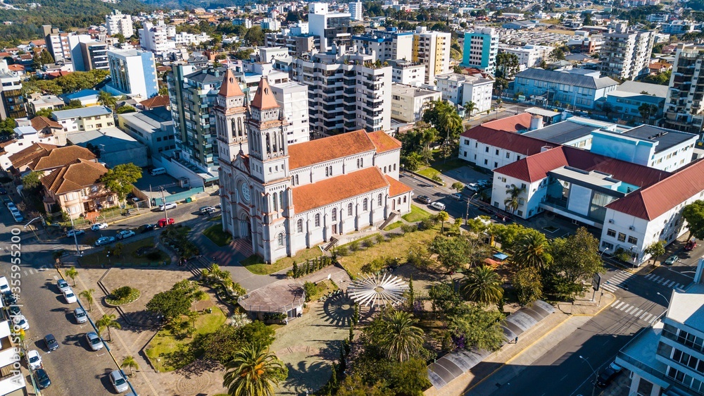 Obraz premium Farroupilha city center - RS. Aerial view of the cathedral and the city center of Farroupilha, Rio Grande do Sul, Brazil