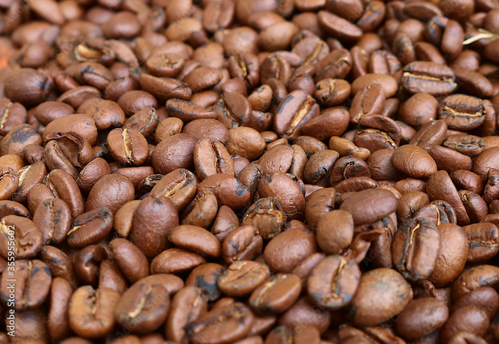 A close up photo of rich full of flavour coffee beans. A close up photo of rich full of flavour coffee beans.