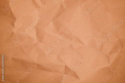 Brown Sheet crumpled paper color background Close up Copy space