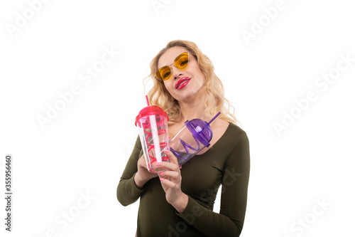Sexy blonde posing with two cocktail glasses. Isolated