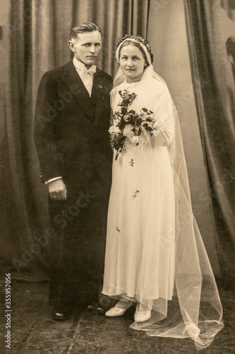 Germany - CIRCA 1920s: Shot of just married couple in studio, Vintage wedding art deco era photo