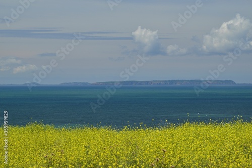 Isle of Sark, U.K. Telephoto image of neighbouring island shot from Jersey. photo