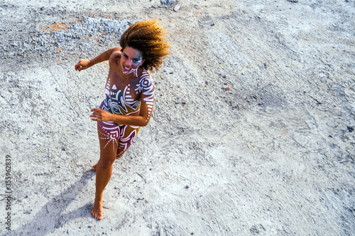 Fotografie A young woman with body art painting