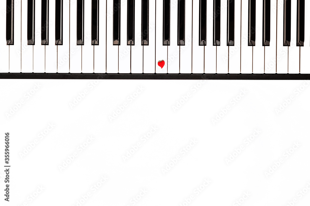 white and black piano keys, a small red heart on one of the keys, musical background, concept of love, music, favorite melody white and black piano keys, a small red heart on one of the keys, musical background, concept of love, music, favorite melody