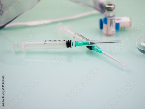 Medicines, injection, vaccines, glasses and face masks, vaccination against viruses.