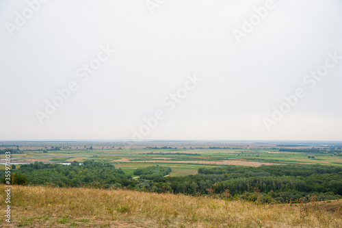 Steppe  not high mountains covered with forests. Landscape