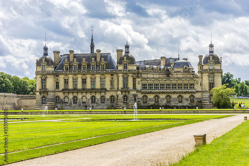 Famous Chateau de Chantilly (Chantilly Castle, 1560), is a historic chateau located in town of Chantilly, Oise, Picardie, France.  photo