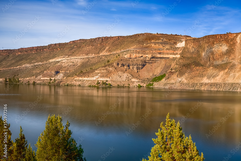 Desert cliffs and water reflection landscape. The Cove Palisades State park, Billy Chinook lake in Central Oregon 