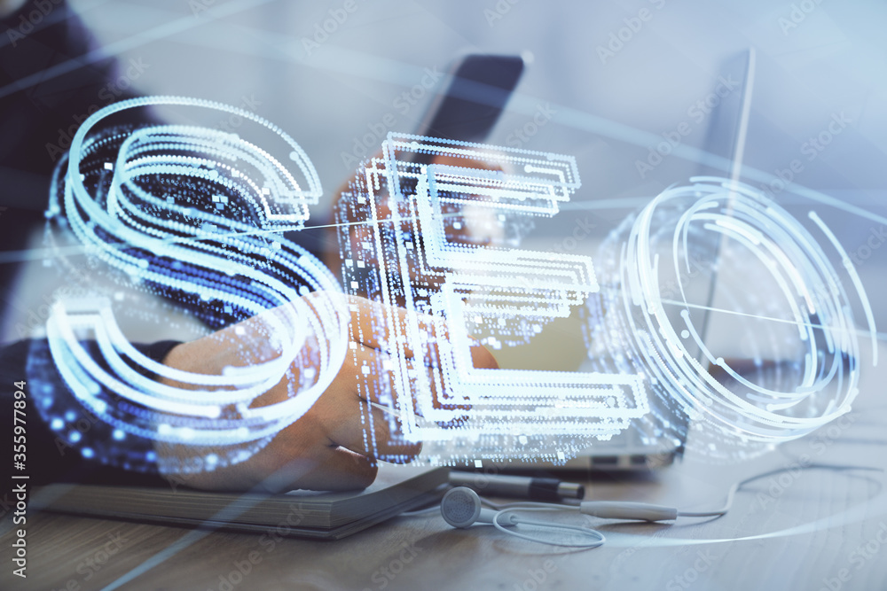Multi exposure of man's hands holding and using a digital device and seo drawing. search optimization concept. Multi exposure of man's hands holding and using a digital device and seo drawing. search optimization concept.