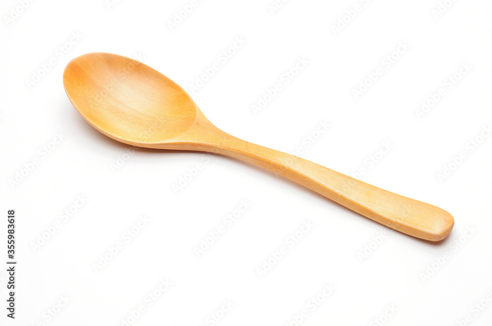 Wooden spoon on a white background Wooden spoon on a white background