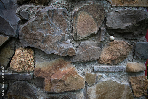 Old walls. Old masonry. Stone background. Garden fence