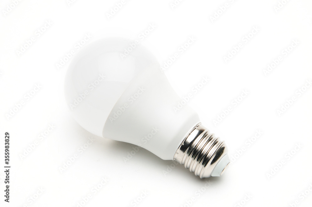 Economic LED lamp for lighting on a white background Economic LED lamp for lighting on a white background