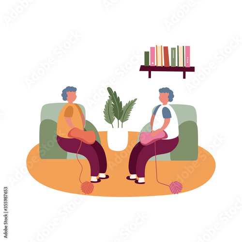 elderly couple embroidering crochet in home activity free form style