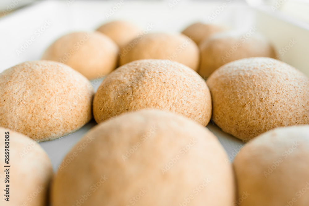Wheat dough with flour. Cooking pizza with italian Yellow dough. Food blanks in restaurant. Flour products Wheat dough with flour. Cooking pizza with italian Yellow dough. Food blanks in restaurant. Flour products