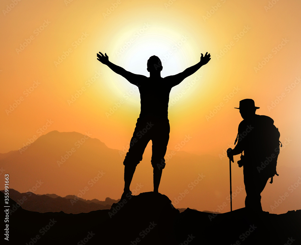 Open his arms, silhouette man silhouette at sunset Open his arms, silhouette man silhouette at sunset