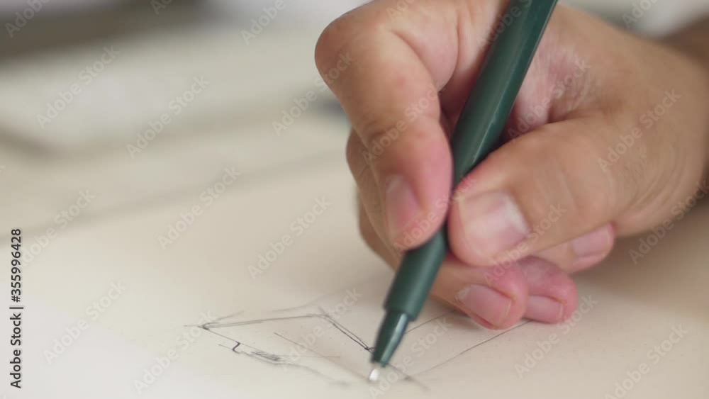 designer draws sketch with fine point pen slow motion designer draws sketch with fine point pen slow motion