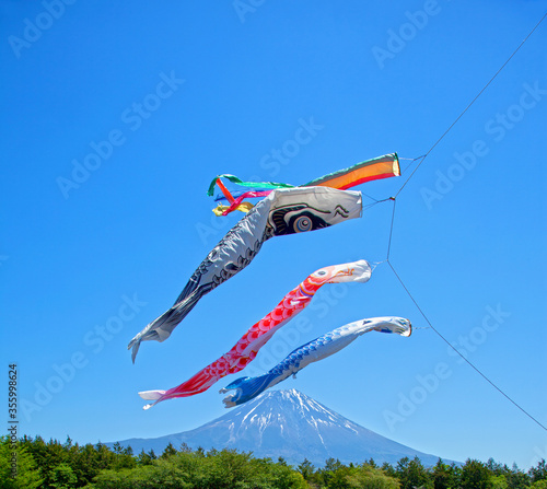 Colorful koinobori carp kites at the Asagiri Highlands near Mount Fuji in Japan. photo