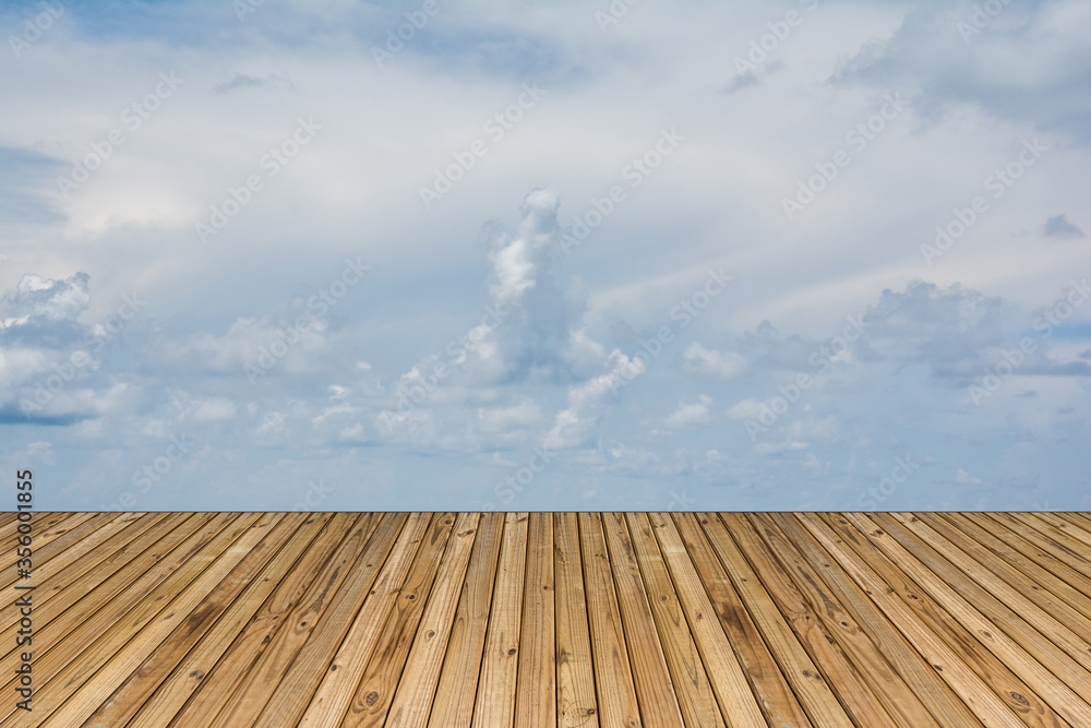 Blue sky and wood floor for background