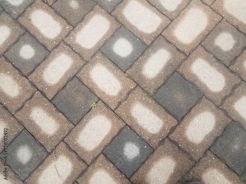 wet and drying stone tiles on ground or background
