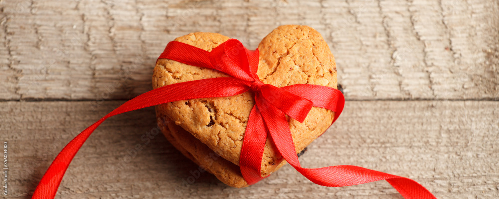 Heart cookies on rustic wooden background, heart shaped cookies for Valentine's day - delicious homemade natural organic pastry, baking with love for Valentine's day, love concept Heart cookies on rustic wooden background, heart shaped cookies for Valentine's day - delicious homemade natural organic pastry, baking with love for Valentine's day, love concept