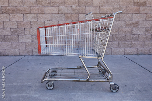 Supermarket trolley on the street outside the store