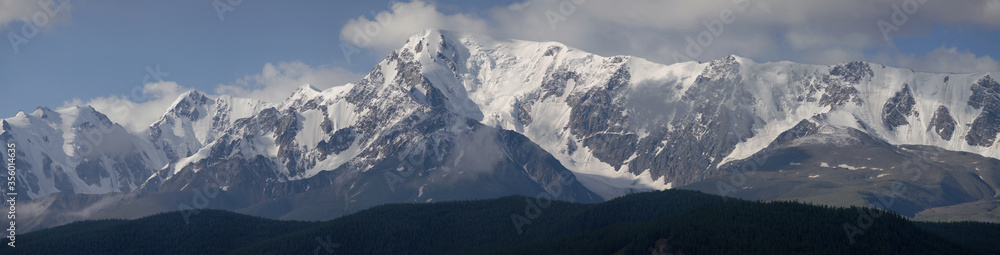 Snow-covered mountain range, panorama nature, Altai. Traveling in the mountains, climbing. 