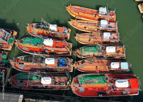 Fleet of fishing boats in port in Thailand.  © Richard Carey