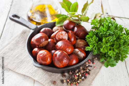 chestnuts on a table with spices, selective focus