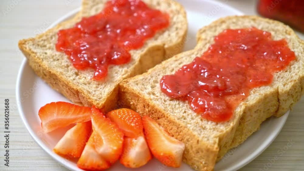 homemade whole wheat bread with strawberry jam and fresh strawberry homemade whole wheat bread with strawberry jam and fresh strawberry