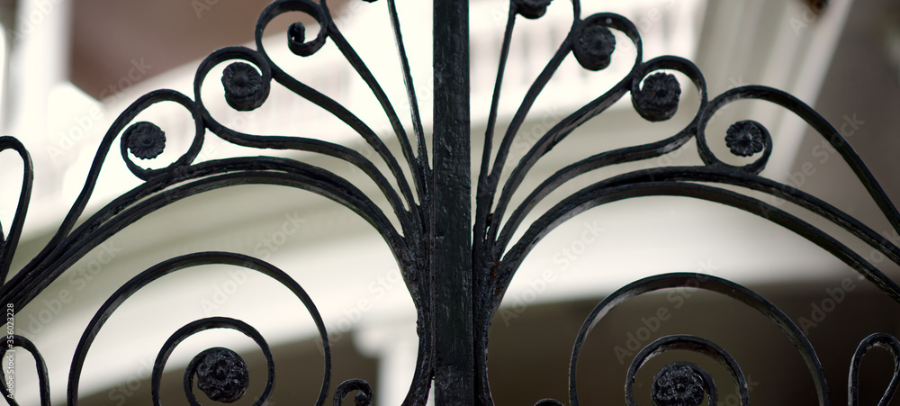 Naklejka premium Parts of very old wrought iron gates.