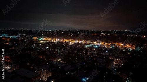 Wallpaper Mural Dramatic aerial nighttime weather time lapse as an intense storm system and clouds move over the city and residential neighborhoods with Strikes of Lightning flashing and lighting up the night. Torontodigital.ca