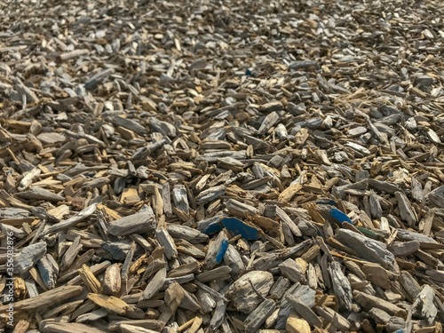 Close up of wood shavings spread on the ground