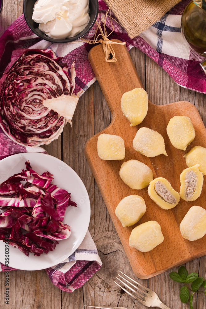 Potato gnocchi stuffed with radicchio and ricotta.
