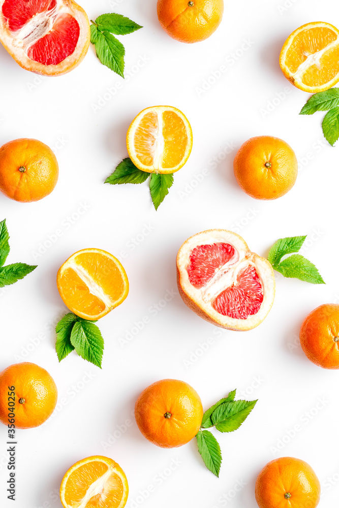 Citrus pattern on white background top view