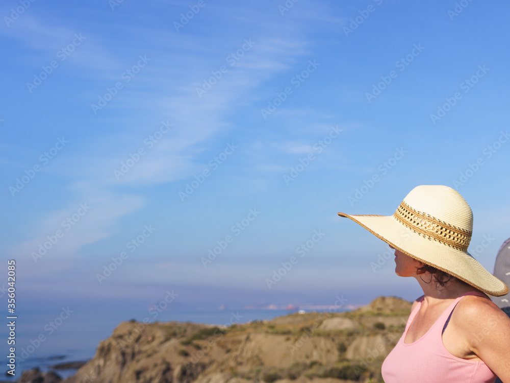Woman enjoy coast view in Spain