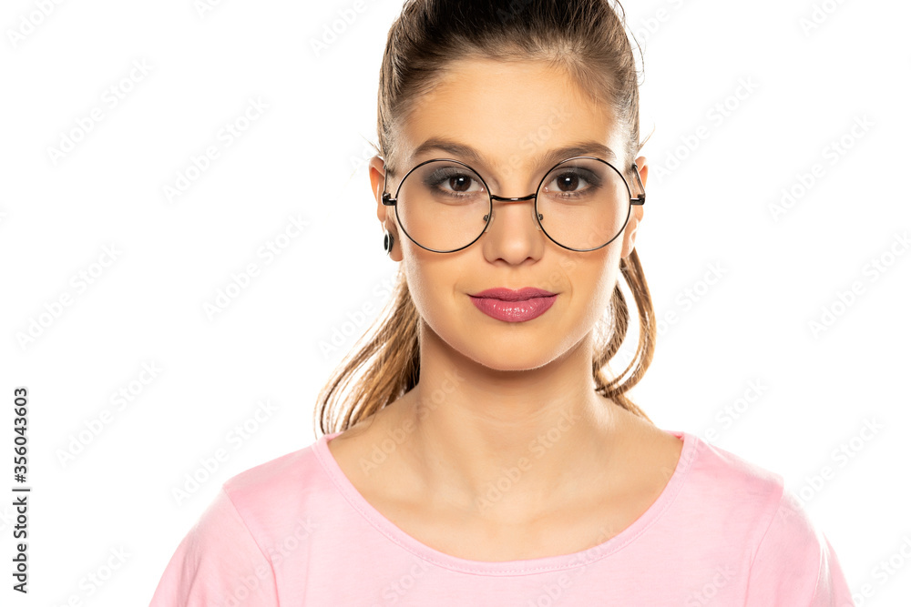 Portrait of young beautiful smiling woman with glasses Portrait of young beautiful smiling woman with glasses