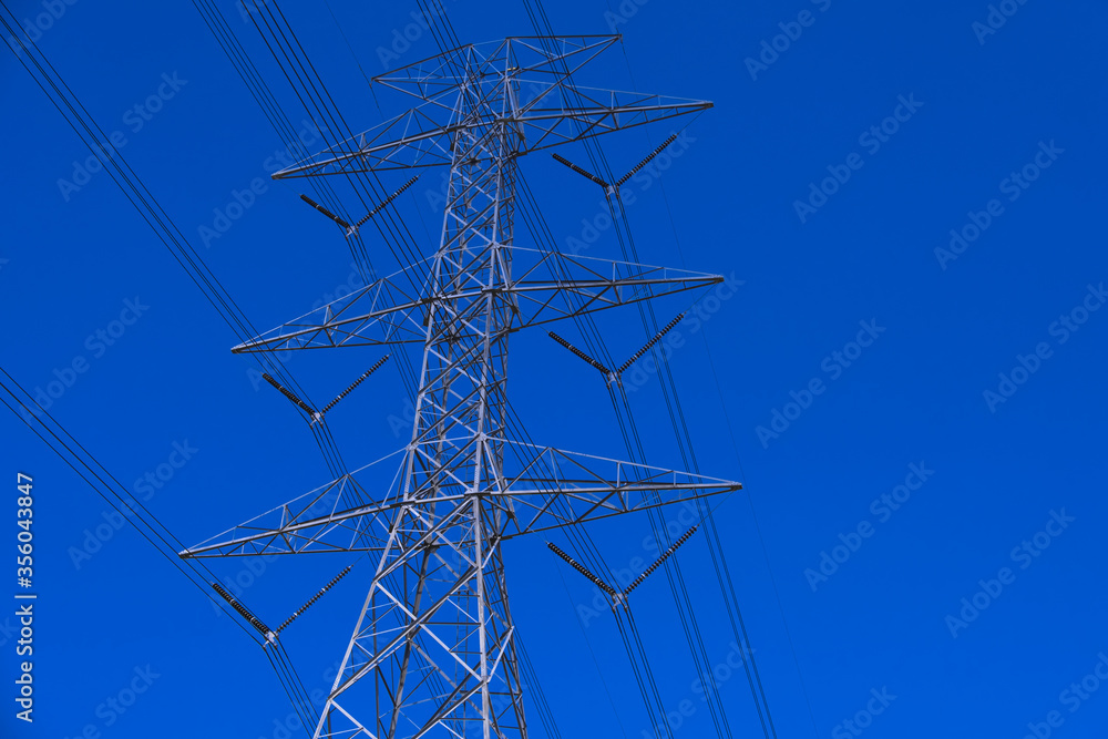 Electrical tower station wiring power with clearly blue sky background, High voltage station post Electrical tower station wiring power with clearly blue sky background, High voltage station post