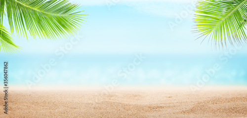 Fototapeta Naklejka Na Ścianę i Meble -  Summer tropical sea with sparkling waves, sand and blue sunny sky