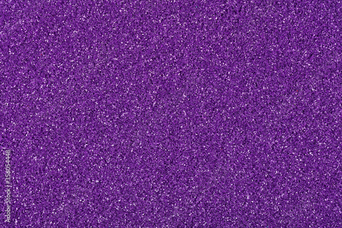 Glitter background in perfect violet tone, texture for your elegant design view.