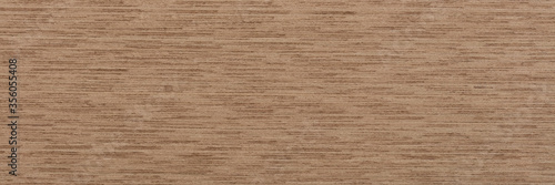 Expensive grey oak veneer background for your new interior. Natural wood texture, pattern of a long veneer sheet, plank.