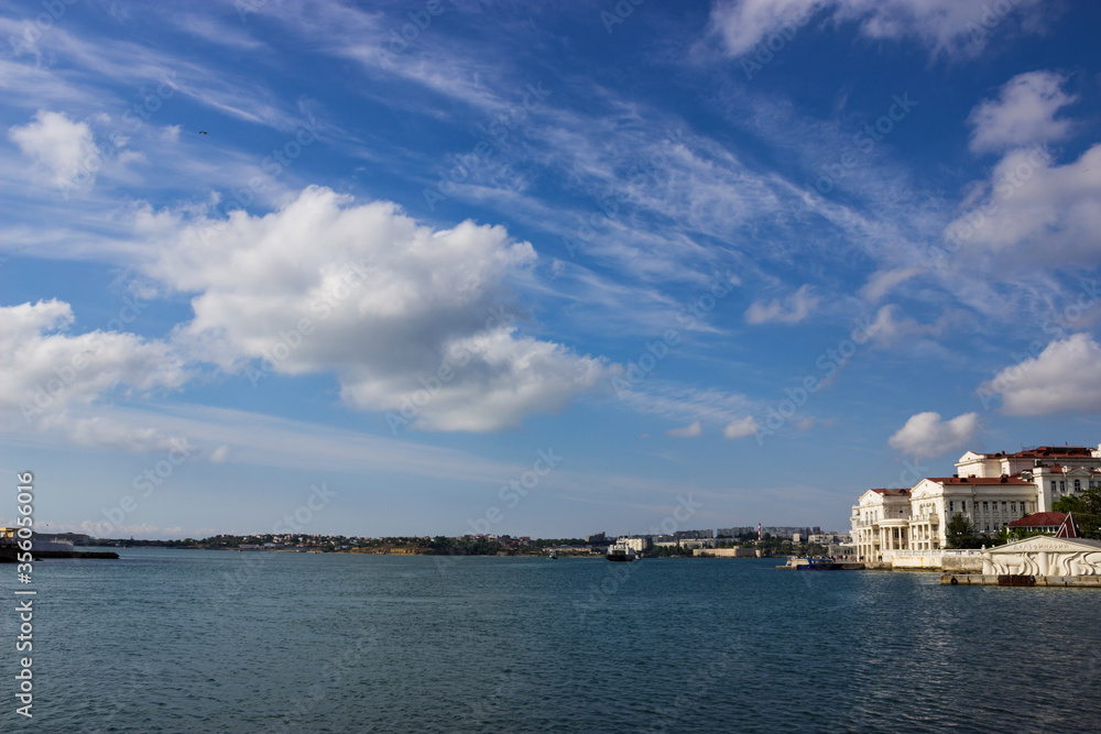 Beautiful sky with clouds on the embankment of the city of Sevastopol