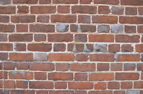 red rectangle brick wall or masonry or tessellation