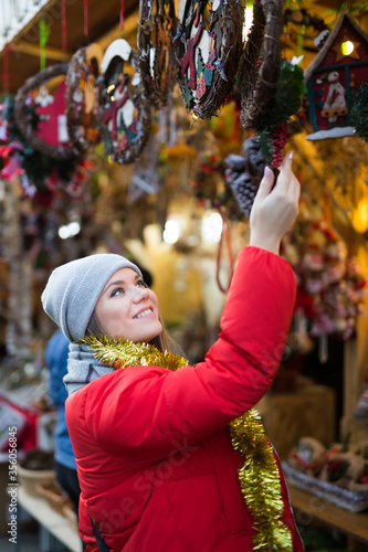 Girl shopping Christmas decorations © JackF