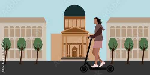 Scootering girl in a city