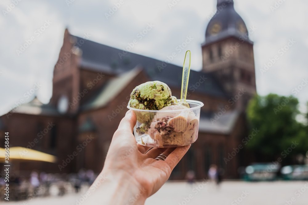 Eating ice-cream in the center of Riga old town