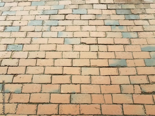 red bricks or rectangles on ground or sidewalk or background