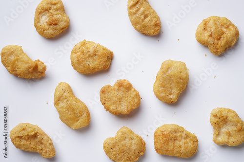 Chicken nuggets composition on white background. Copy space for text.
