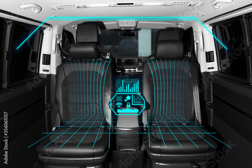 Futuristic technology. Car interior with graphical user interface
